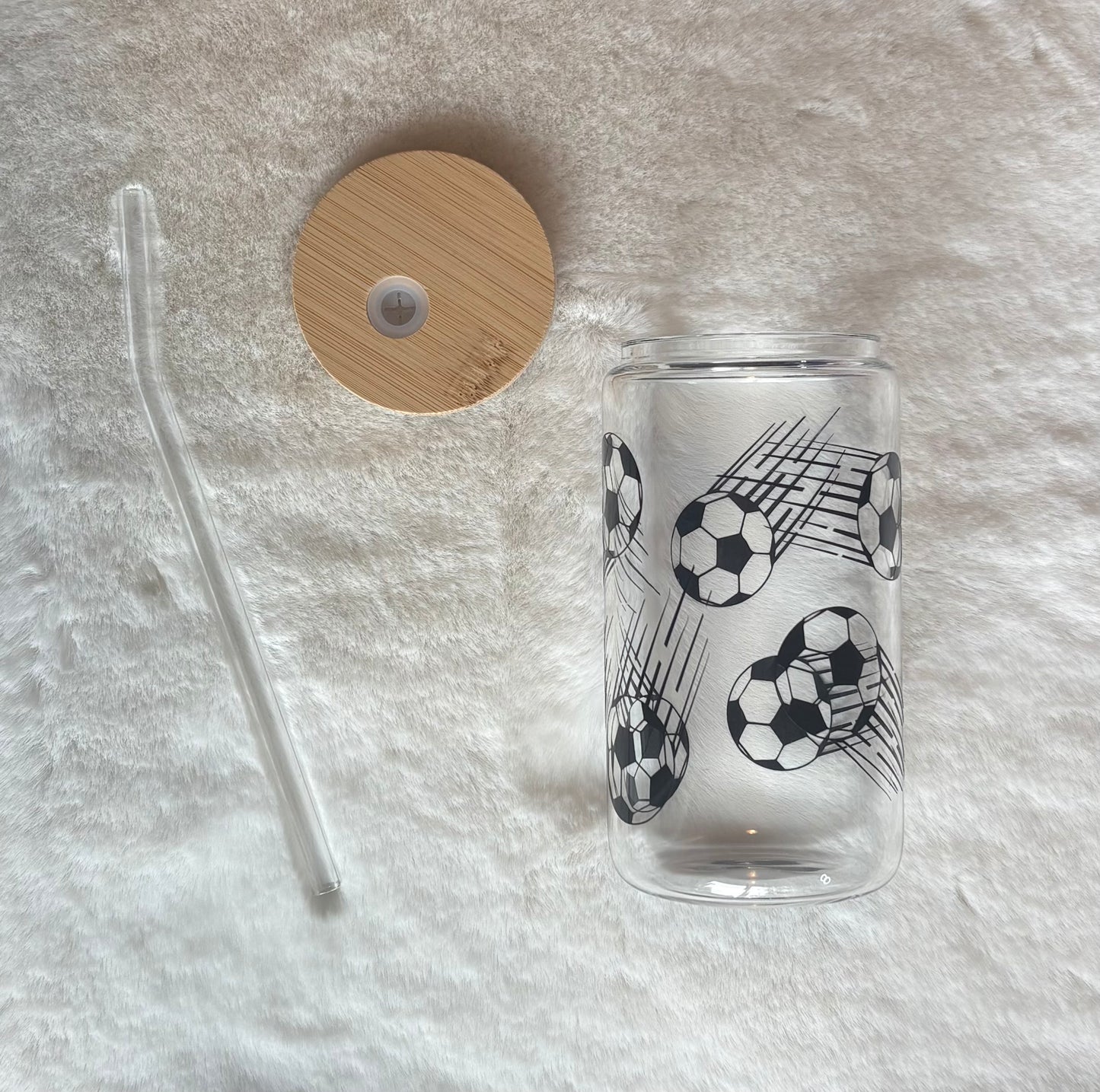 16oz Glass Cup - Soccer Flying Ball | Stylish Drinkware for Every Occasion