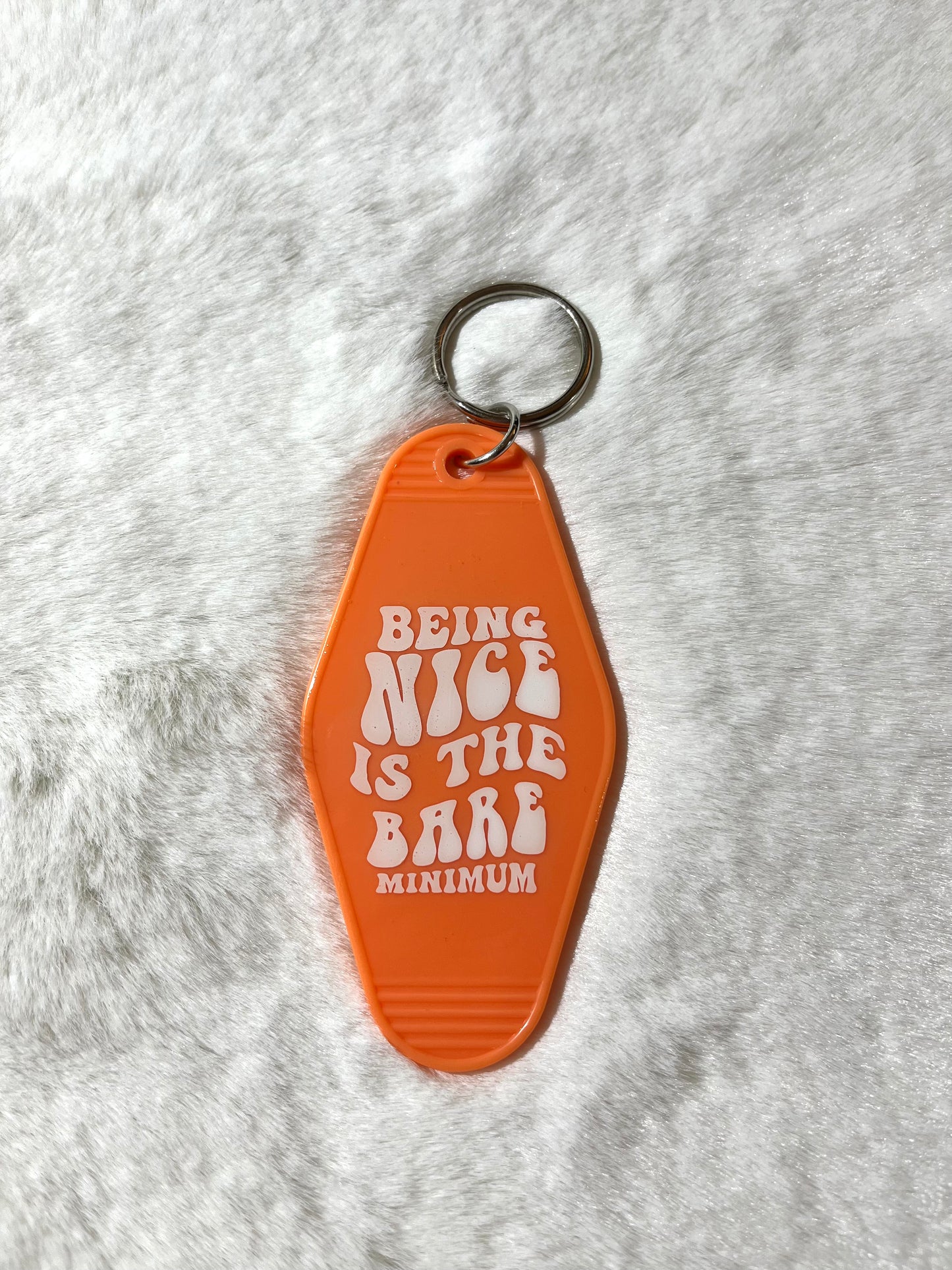 Motel Keychains - Being Nice is The Bare Minimum